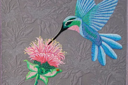Spotlite™ is easy to layer and stitch in multiple directions, giving you the ability to create stunning thread painted pieces. Project pictured by Teri Cherne.