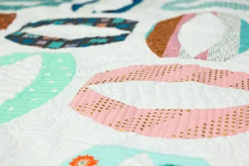 Konfetti™ can be used for quilting or longarming to elevate your projects for a clean professional finish.
