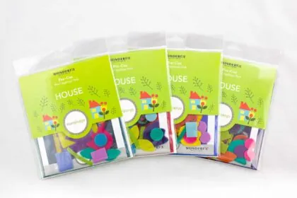 A close-up of Sue Spargo Eleganza pre-cut wool kits.