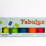 A close-up of FabuLux pack, our trilobal polyester thread.