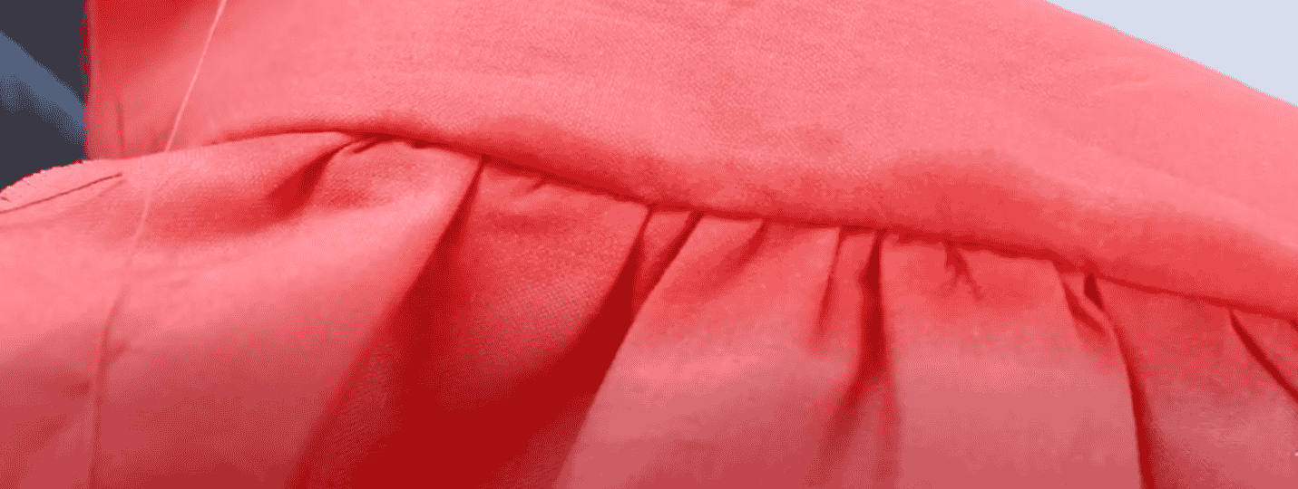 A close up of a red blanket Description automatically generated
