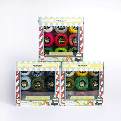 A close-up of Eleganza™ 8wt Perle Cotton Holiday Pack