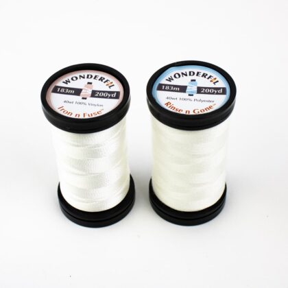 Close-up of Iron 'n Fuse and Rinse 'n Gone, ideal quilting threads.