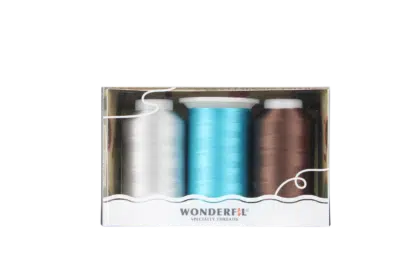 Close-up of a BOM 2025 piecing pack featuring DecoBob threads.