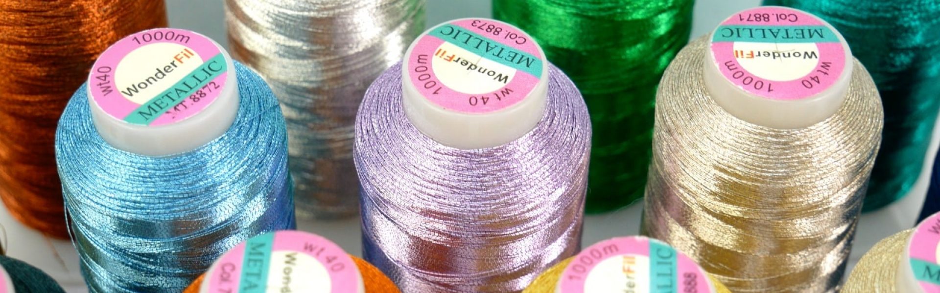 A photo of Spotlite rayon core metallic threads.